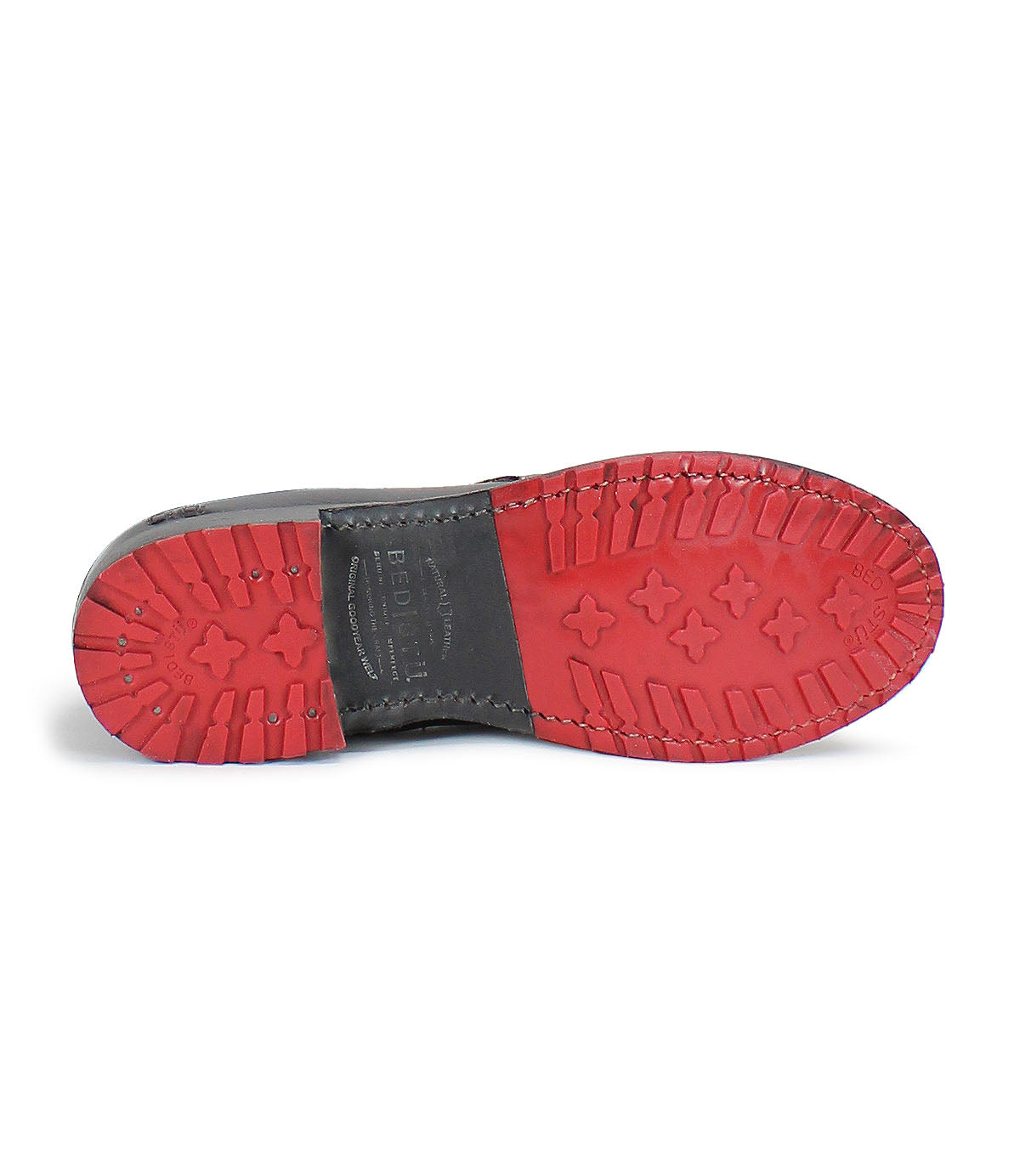 A pair of Bed Stu Bristol Wide Calf shoes with red and black soles on a white background.