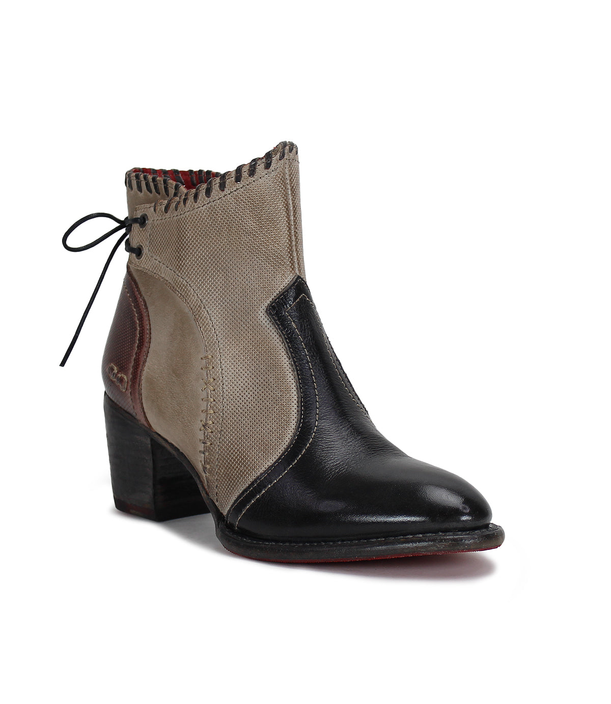 A women's ankle boot with a black, brown and beige color named Bia by Bed Stu.