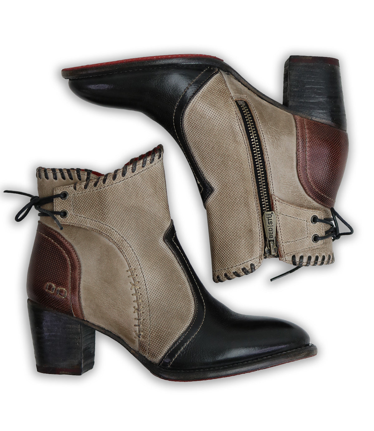 A pair of Bia ankle boots by Bed Stu with tan and black accents.