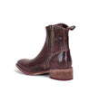 A brown leather "Alina" ankle boot with a zipper on the side, by Bed Stu.