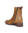 An Alina ankle boot by Bed Stu, made of tan leather and featuring a zipper on the side.