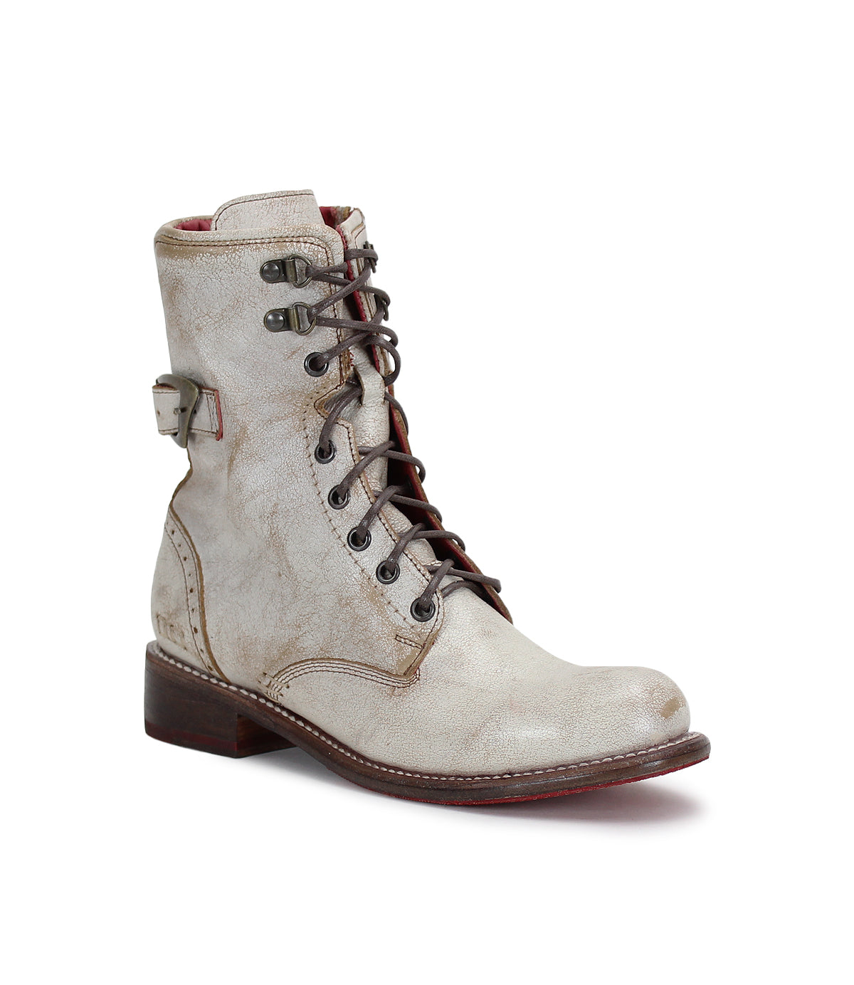 A women's white combat boot with lace ups called "Anne" by Bed Stu.