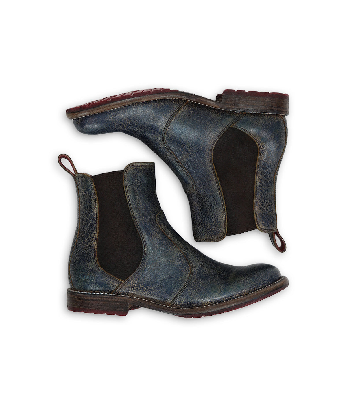 A pair of blue Nandi vegetable tanned leather chelsea boots.