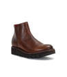 A brown leather Lydyi ankle boot with a black sole by Bed Stu.
