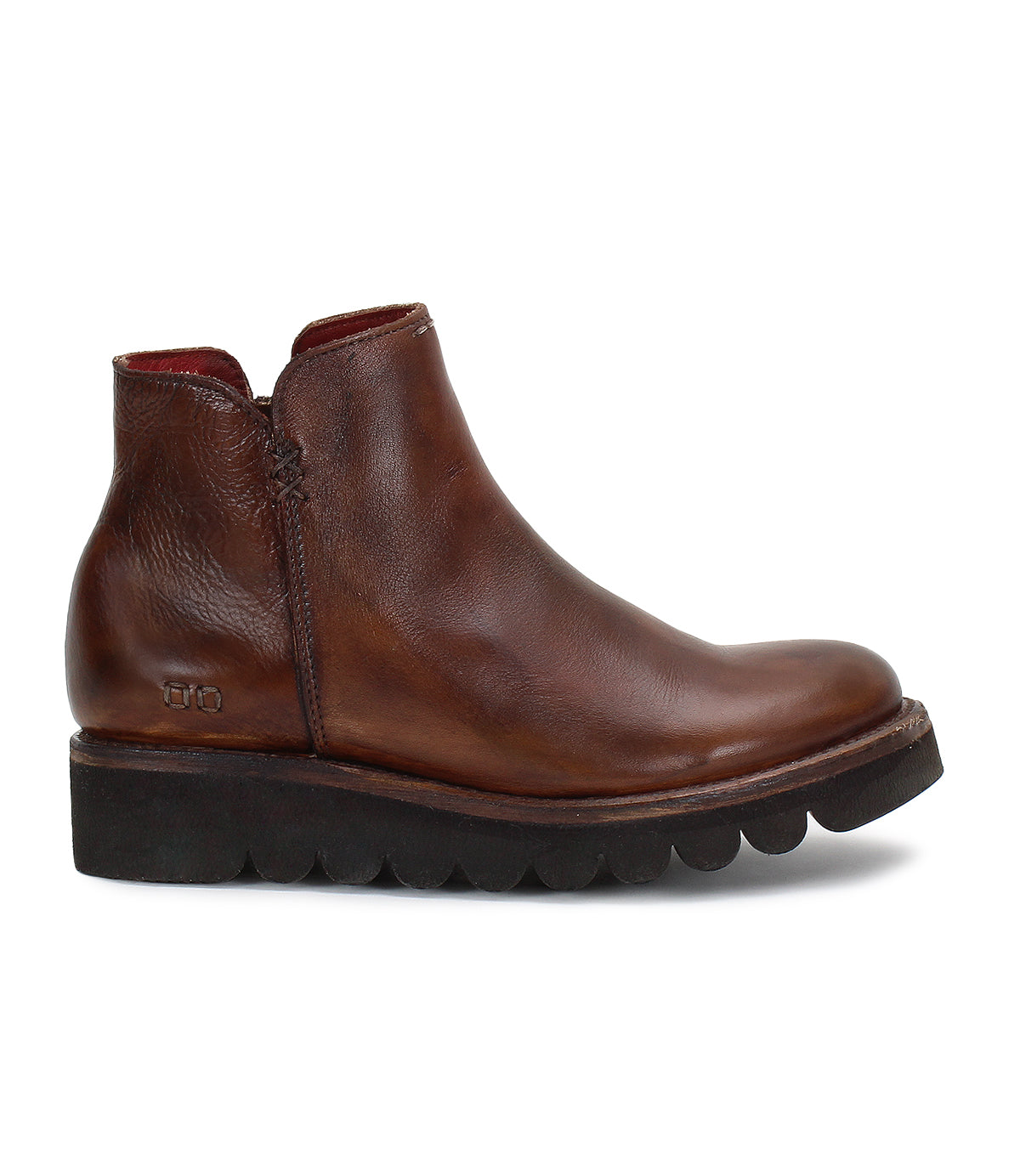A brown leather Lydyi ankle boot with a zipper on the side by Bed Stu.