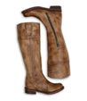 A pair of brown Bed Stu Jacqueline riding boots with zippers on the side.