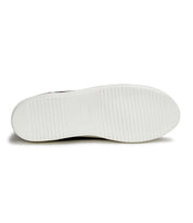 A pair of white Carrington sneakers with a white sole by Bed Stu.