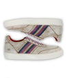 A pair of Carrington sneakers with multi colored stripes by Bed Stu.