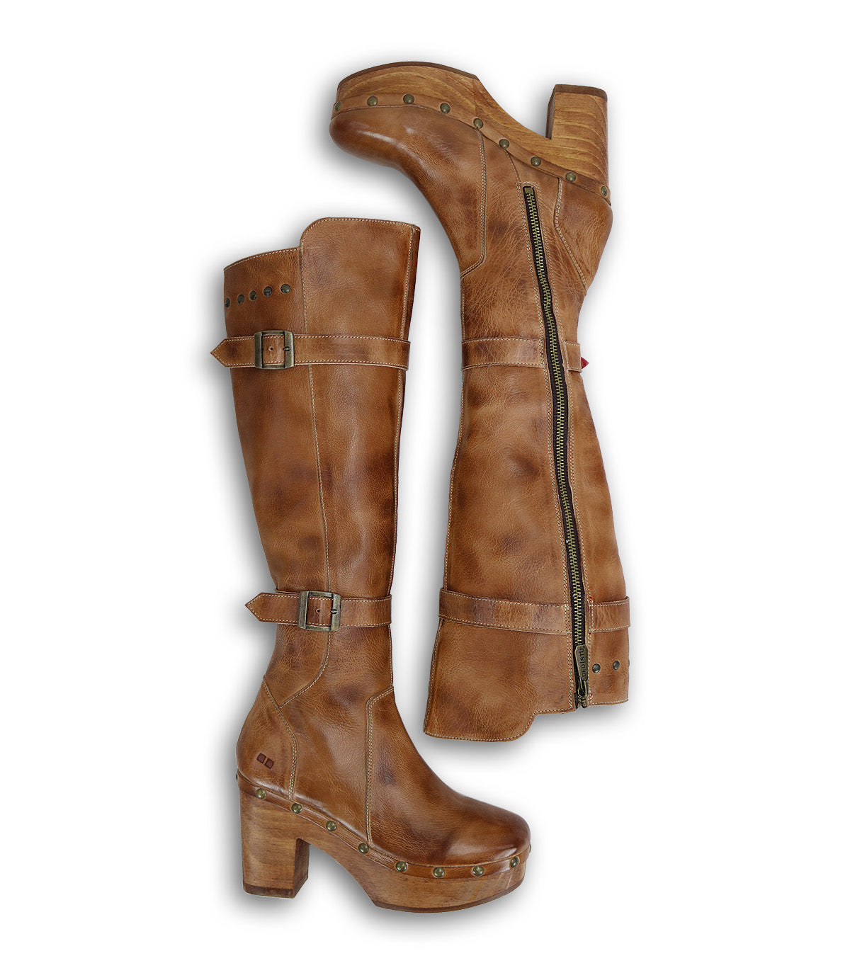 A pair of Ceretti brown boots with buckles on the side by Bed Stu.
