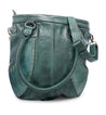 A green Gala bag with studding and handles by Bed Stu.