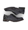 A pair of Bed Stu Galao men's grey leather shoes on a white background.