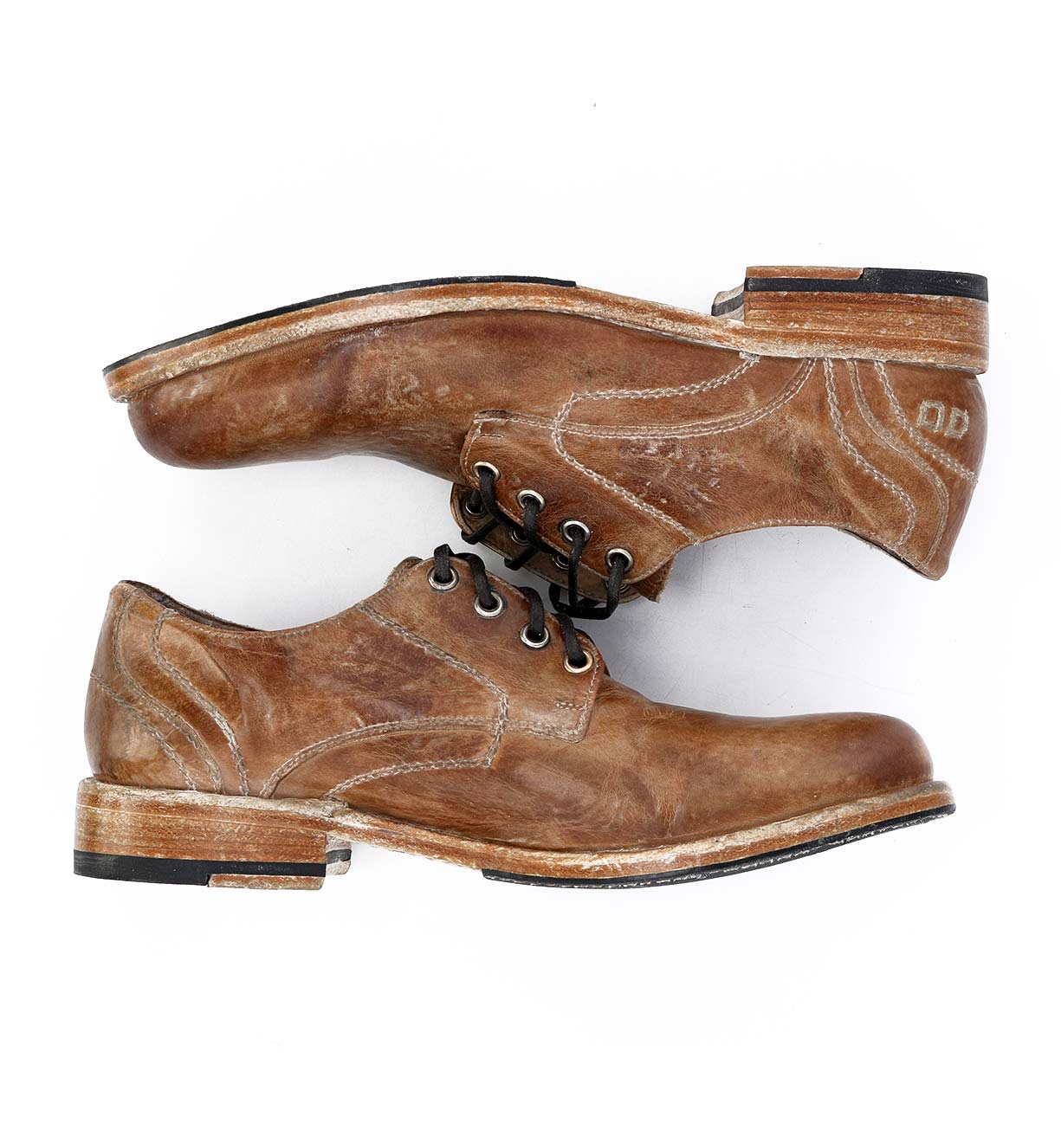 A pair of Bed Stu Galao brown leather shoes on a white background.