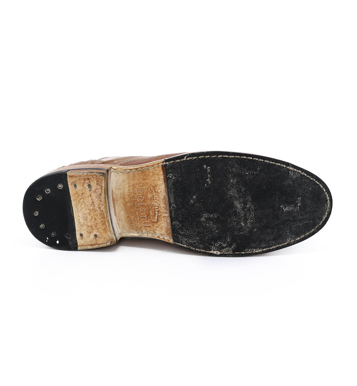 A pair of Galao shoes with black soles on a white background from Bed Stu.