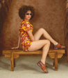 A woman is sitting on a Bed Stu Garden M wooden bench.