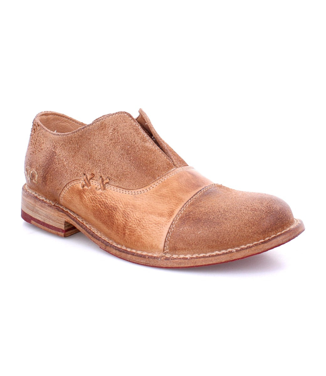 A pair of Bed Stu Garden M men's brown shoes with a tan sole.