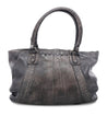 A grey leather Geraldin handbag with studded details, by Bed Stu.