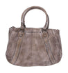 A women's brown leather Geraldin handbag with studded details by Bed Stu.