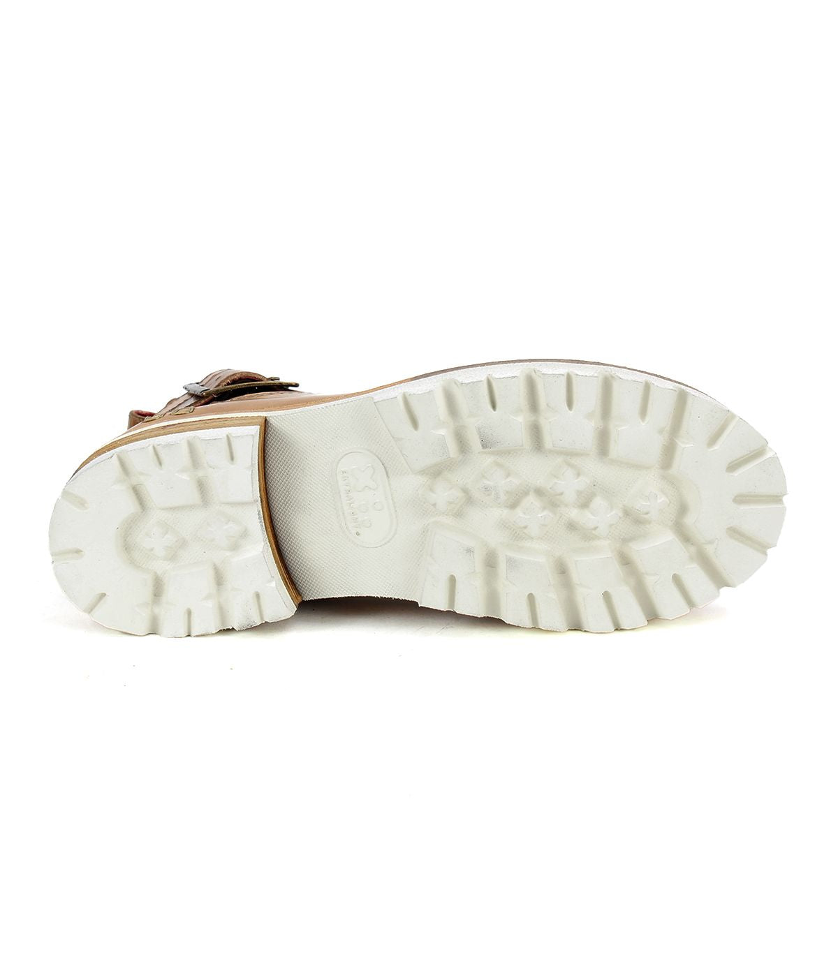 The image showcases the sole of the Ginger II, a white Chelsea ankle boot by Bed Stu, featuring a textured grip pattern, viewed from the bottom to highlight its stylish touches.