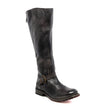 A women's black leather Bed Stu riding boot with buckles.