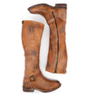 A pair of Glaye brown leather boots with buckles and zippers from Bed Stu.