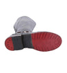 A pair of Bed Stu Glaye Wide Calf women's boots with red soles on a white background.