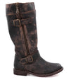 A women's Gogo Lug black leather boot with buckles and buckles by Bed Stu.