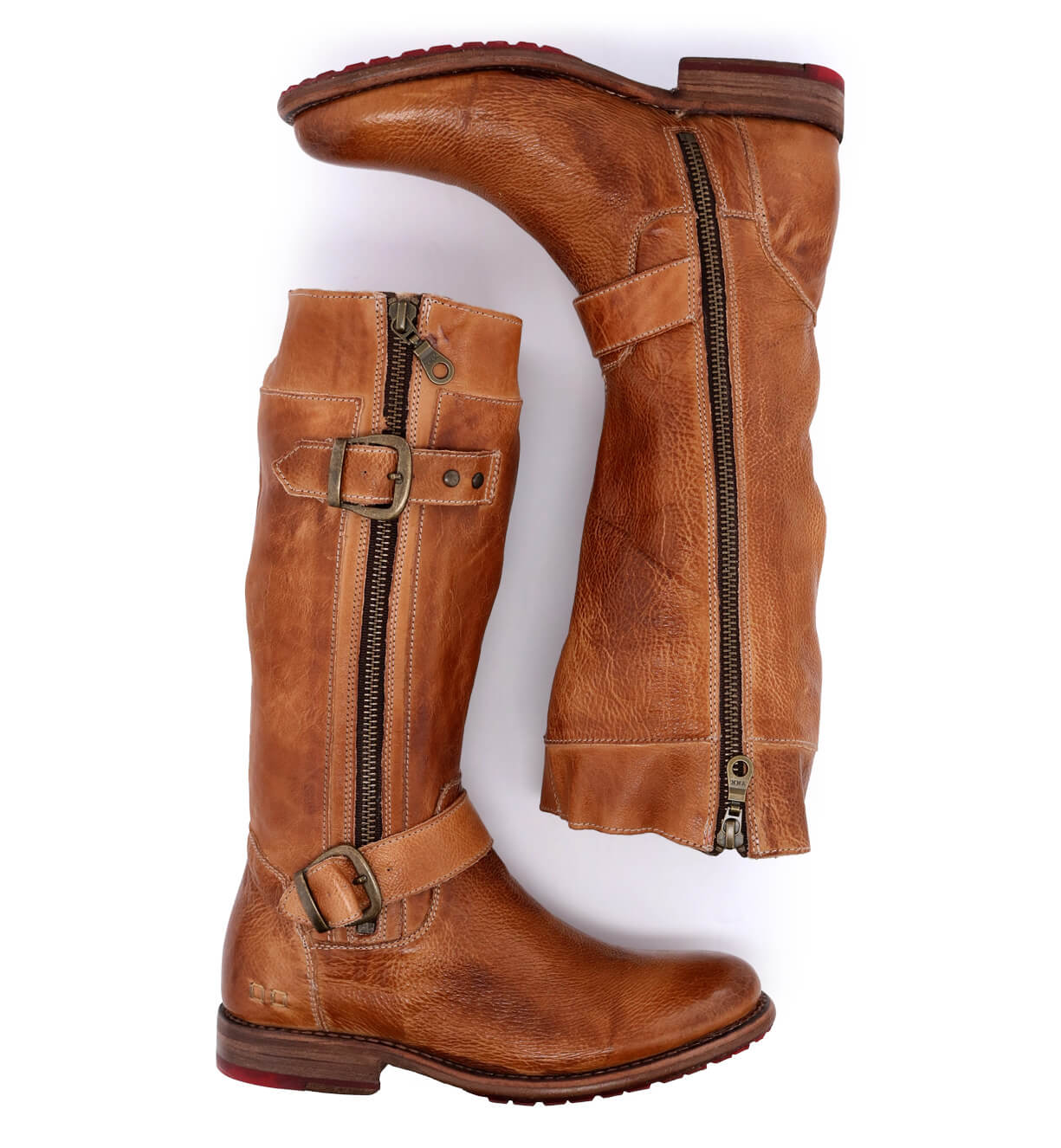 A pair of Gogo Lug tan leather boots with zippers and buckles by Bed Stu.