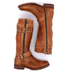 A pair of Gogo Lug tan leather boots with zippers and buckles by Bed Stu.