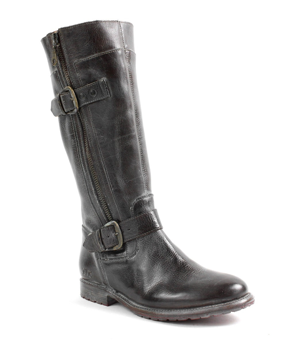 A women's Gogo Lug black leather boot with buckles and buckles by Bed Stu.