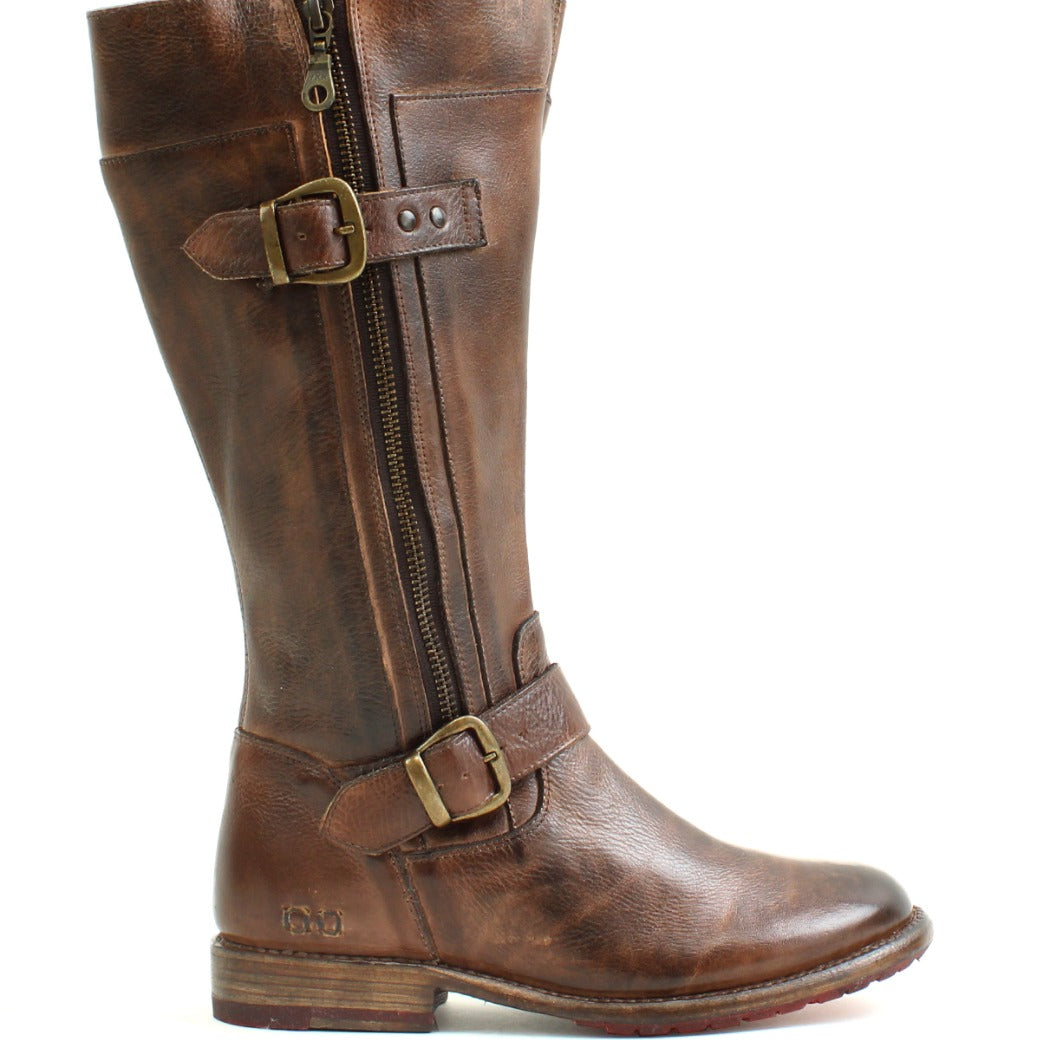 A women's brown leather Gogo Lug Wide Calf boot with buckles by Bed Stu.