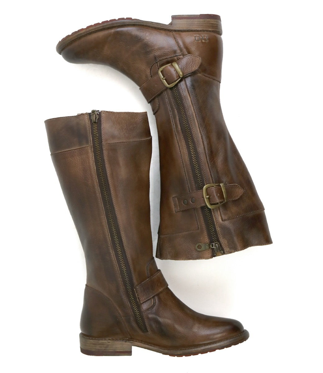 A pair of Gogo Lug Wide Calf brown leather boots with buckles and zippers by Bed Stu.