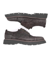 A pair of handcrafted Bed Stu Grant brown leather shoes on a white background.