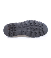 A handcrafted black Grant shoe made with Italian leather, showcasing its durability on a clean white background by Bed Stu.