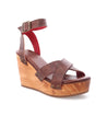 A women's Grettell wooden wedge sandal by Bed Stu with straps.