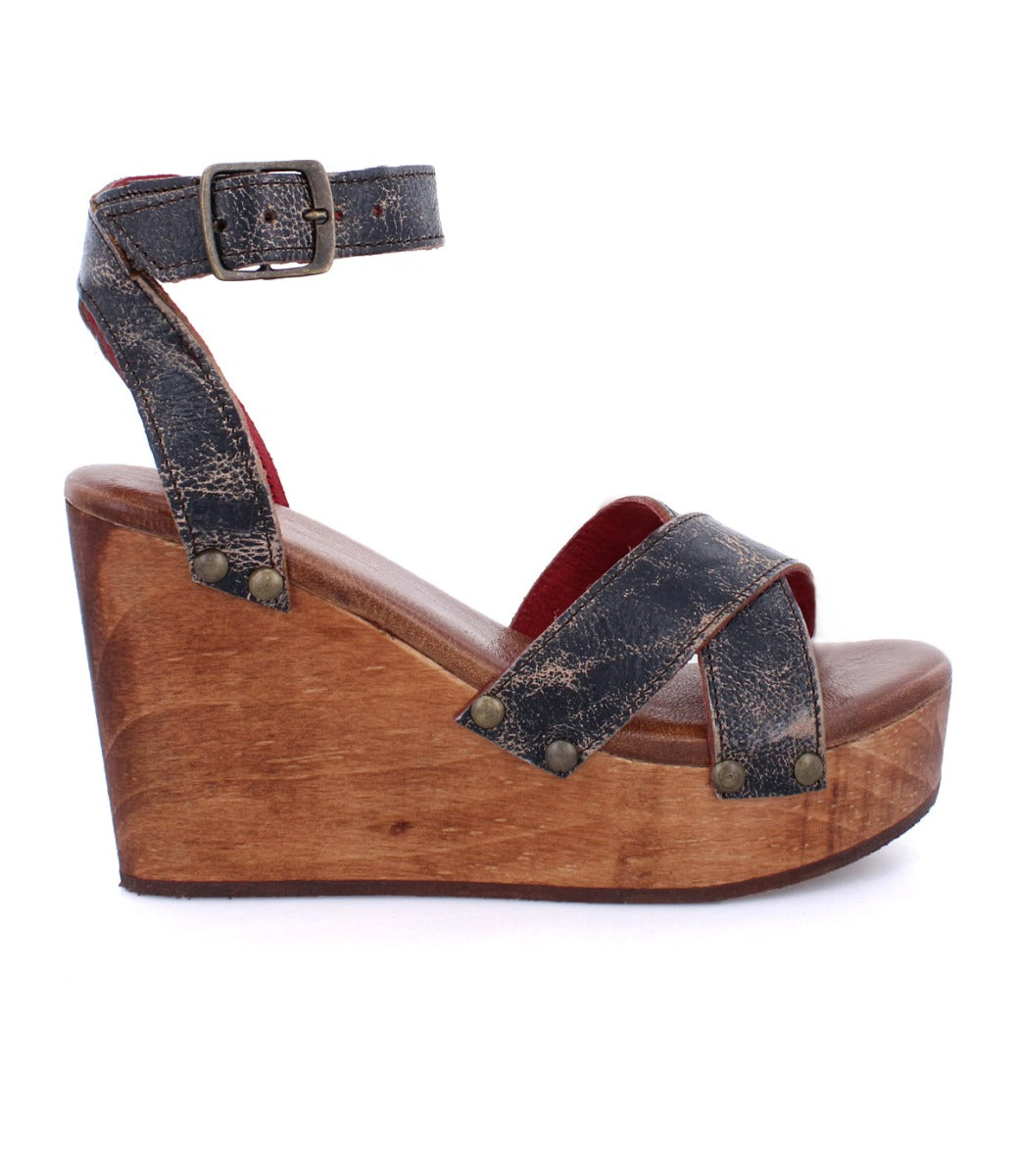 A women's Grettell wooden wedge sandal with straps and wooden heel by Bed Stu.