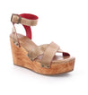 A Grettell wooden wedge sandal with straps by Bed Stu.