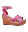 A women's Grettell pink wedge sandal with wooden platform made by Bed Stu.
