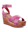A women's pink wedge sandal with wooden straps called Grettell by Bed Stu.