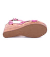 A Bed Stu Grettell women's pink wedge sandal on a white background.