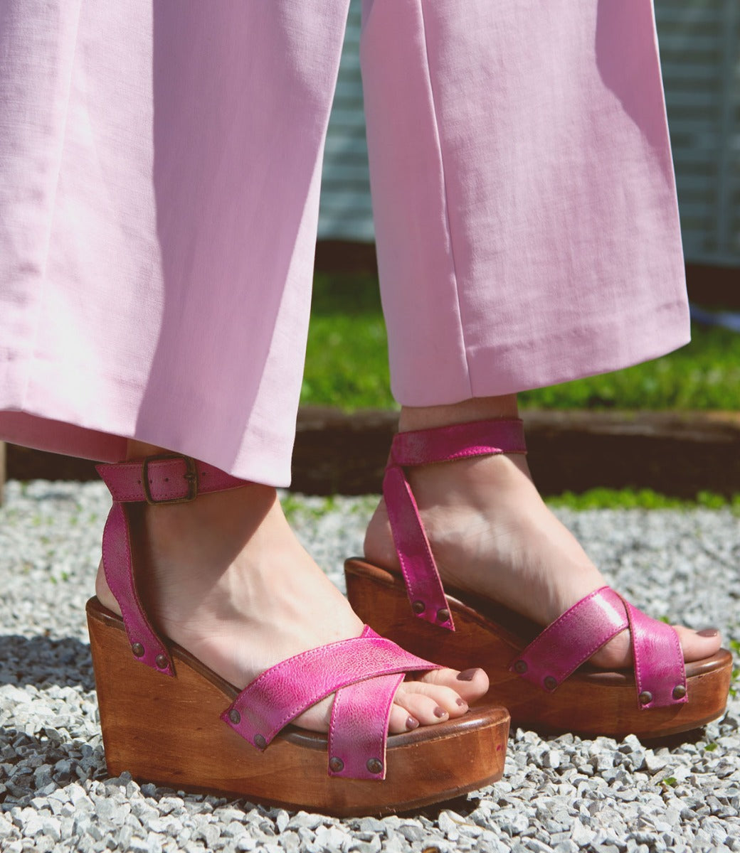 A woman wearing pink pants and Bed Stu Grettell sandals.