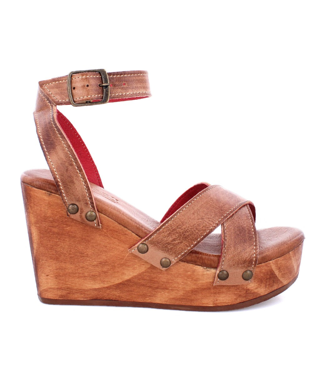 A women's Grettell wooden wedge sandal with straps and a wooden heel by Bed Stu.