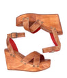 A pair of Grettell wedge sandals with red straps by Bed Stu.
