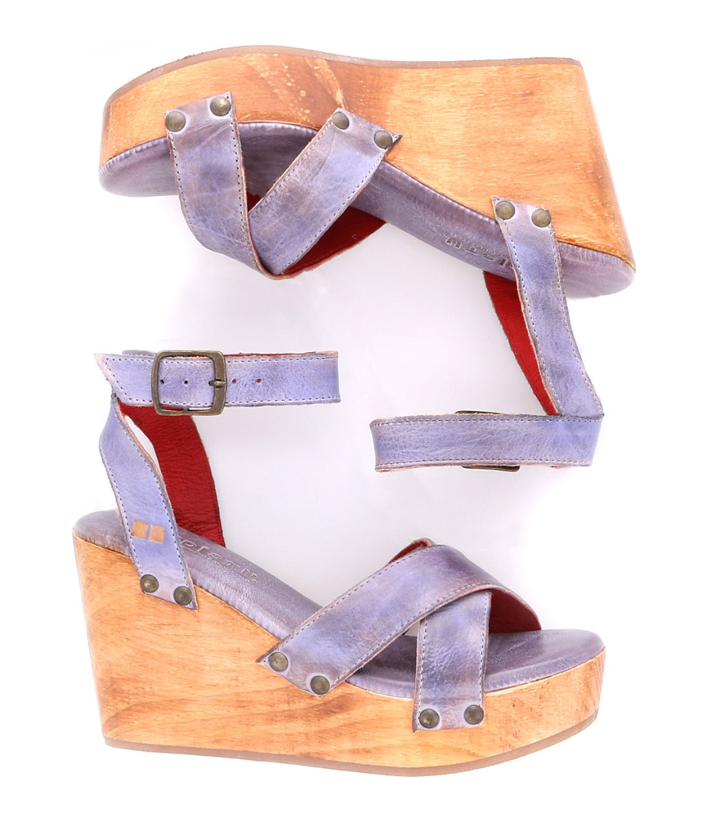 A pair of Grettell wedge sandals with wooden straps by Bed Stu.