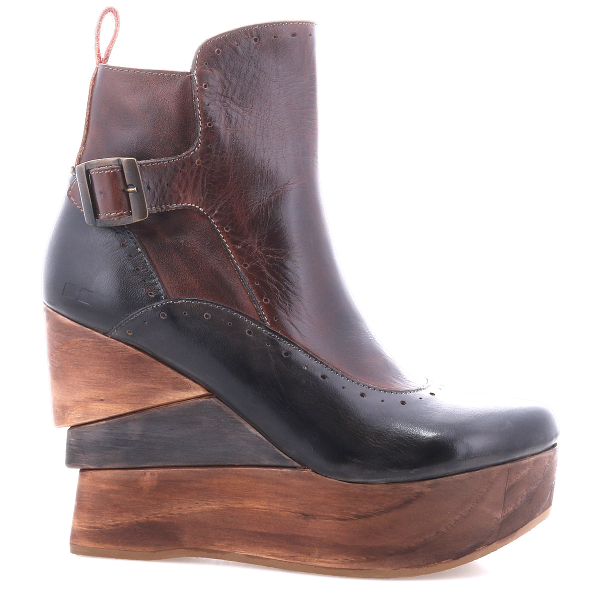 The Bed Stu Harmonious is a brown and black platform wedge ankle boot with a buckle, thick sculptural wood wedge sole, and bold red leather interior.
