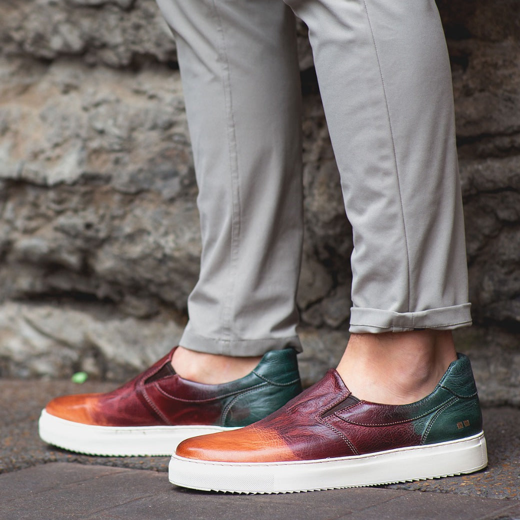 A man wearing a pair of Harry slip on sneakers by Bed Stu.