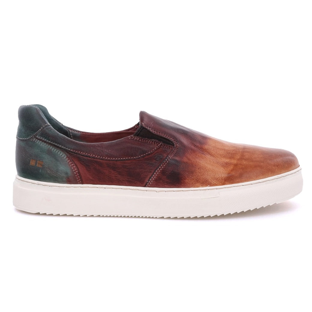 A men's slip on sneaker in a brown and green color, called the "Harry" by Bed Stu.