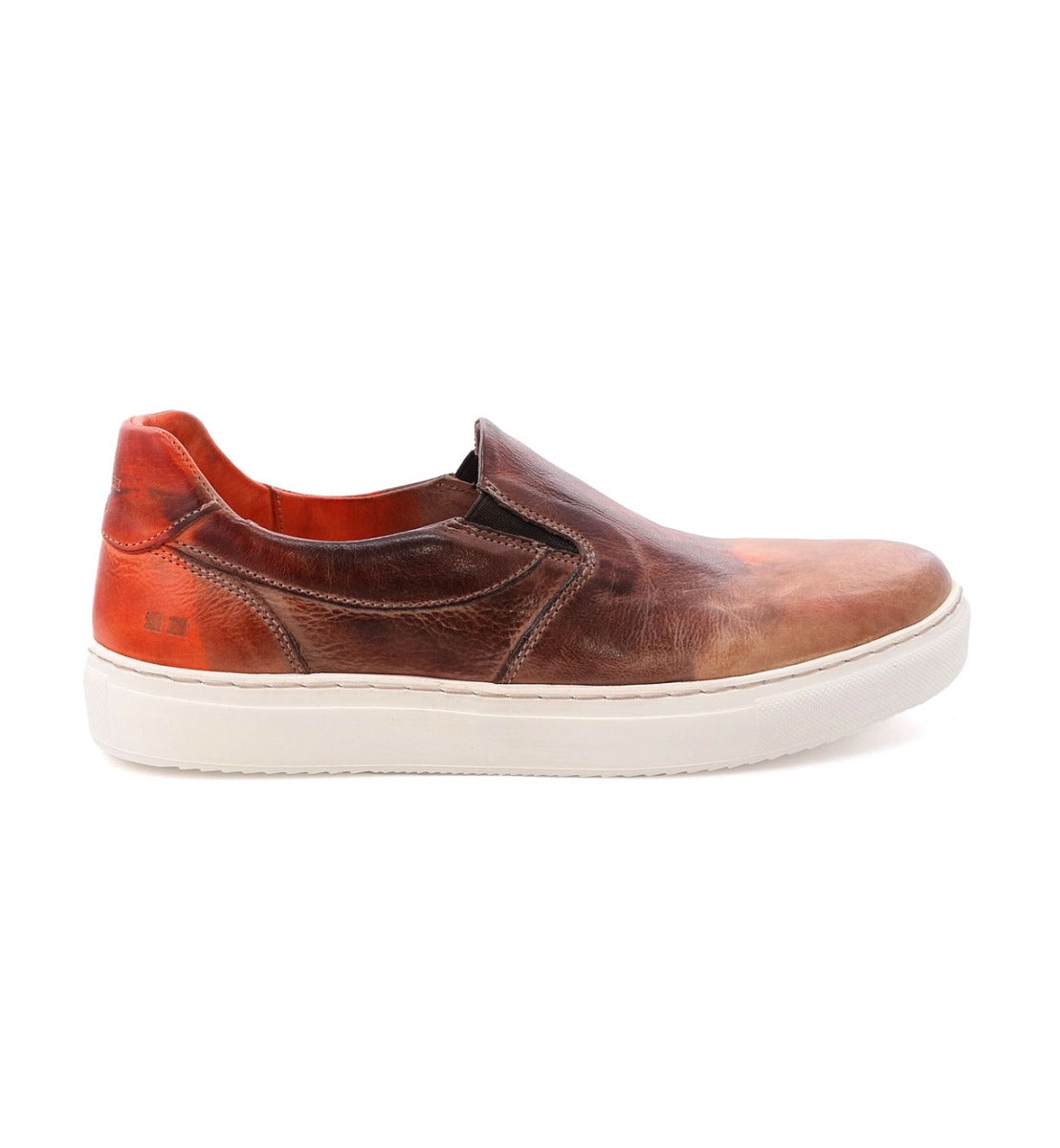 A men's slip on shoe in brown and orange, called Harry by Bed Stu.