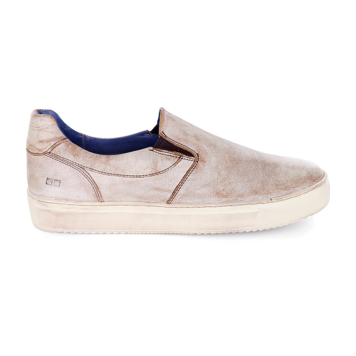 A pair of men's "Harry" slip on sneakers by Bed Stu in beige.