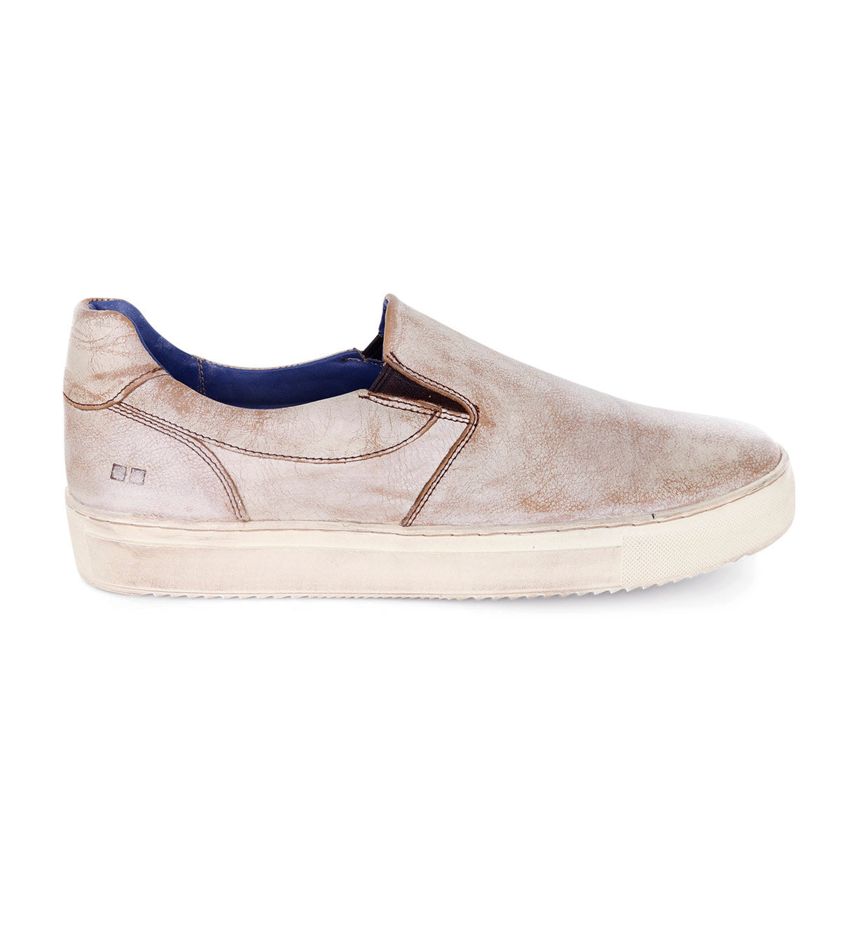 A pair of men's "Harry" slip on sneakers by Bed Stu in beige.