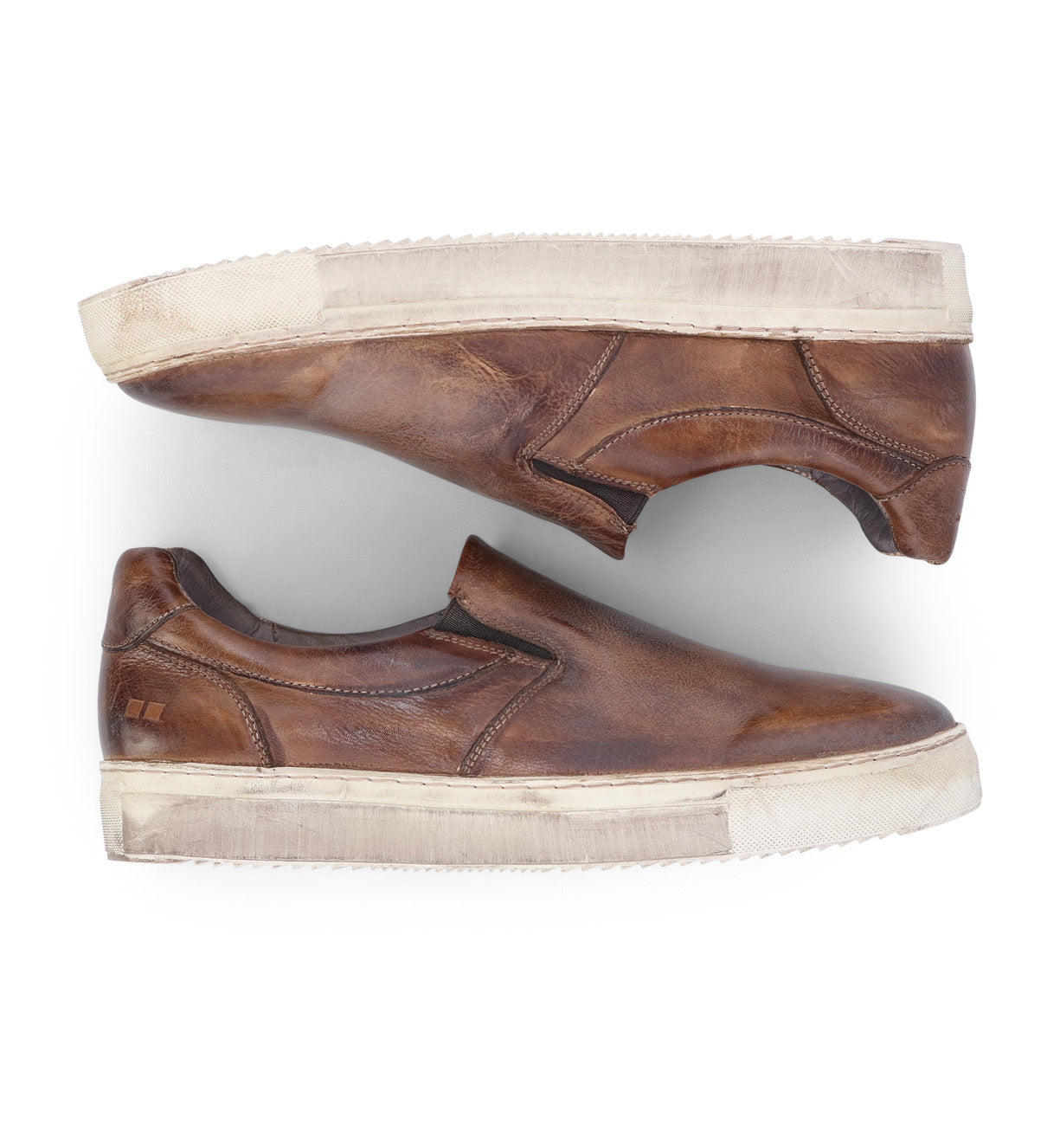A pair of Bed Stu Harry brown leather slip on sneakers.